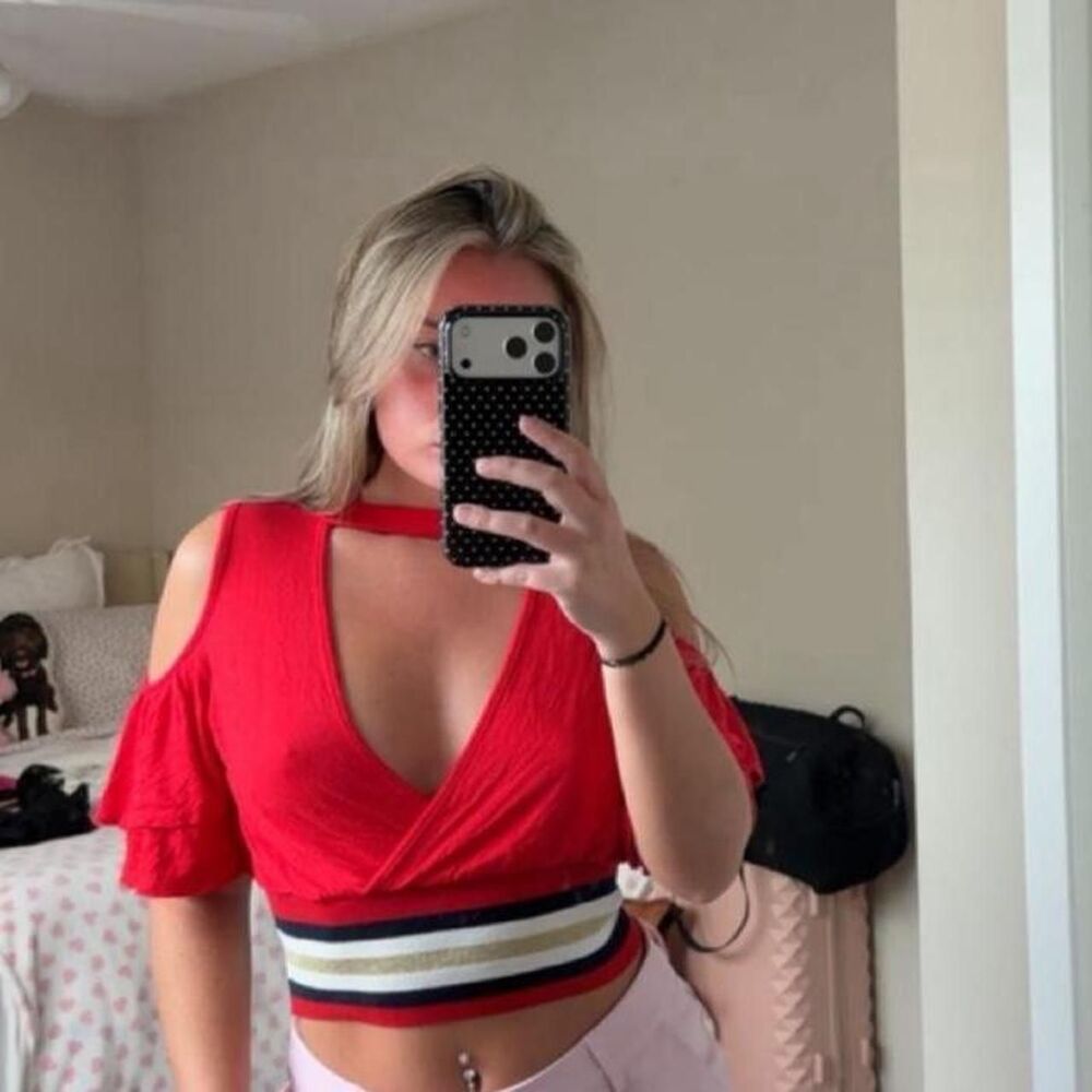 Red striped crop top with a cold shoulder cutout